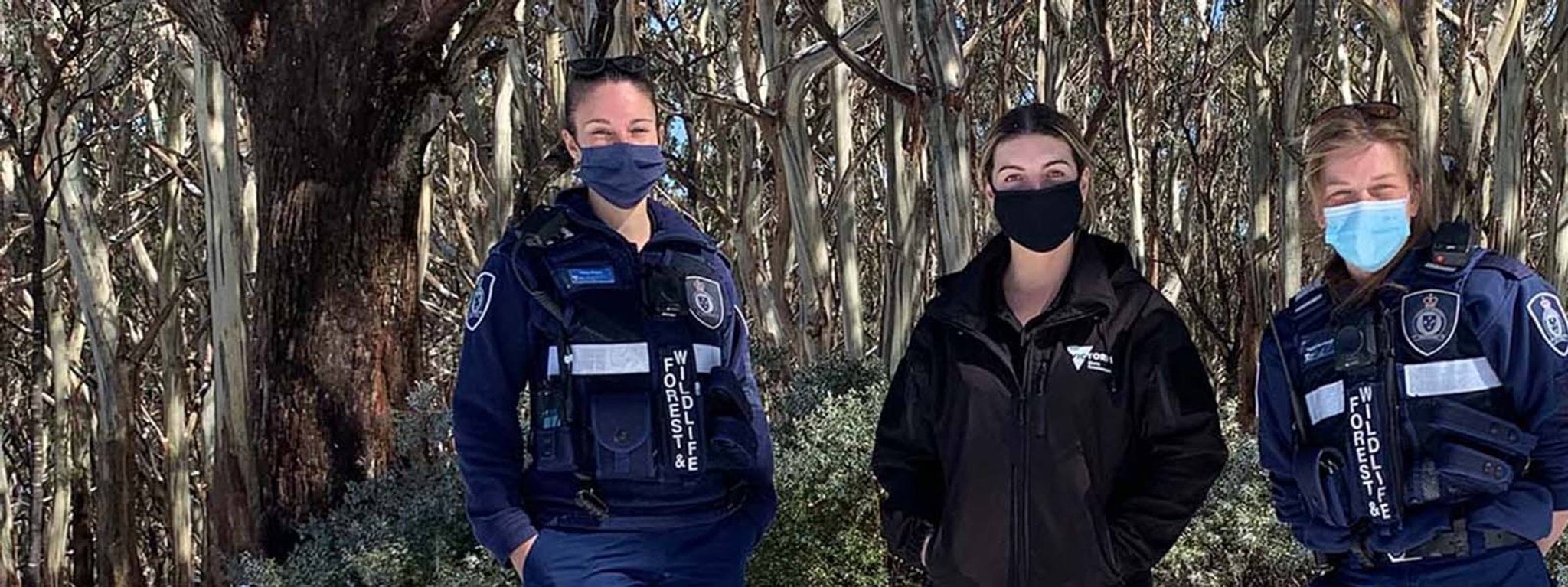 Image of wildlife officers standing together smiling
