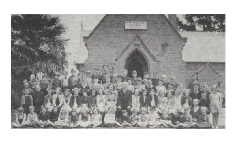 School portrait in front of Winters Flat State School date unknown.