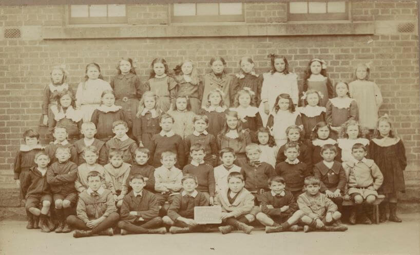 Black and white photograph of students in front of the South Yarra school building.