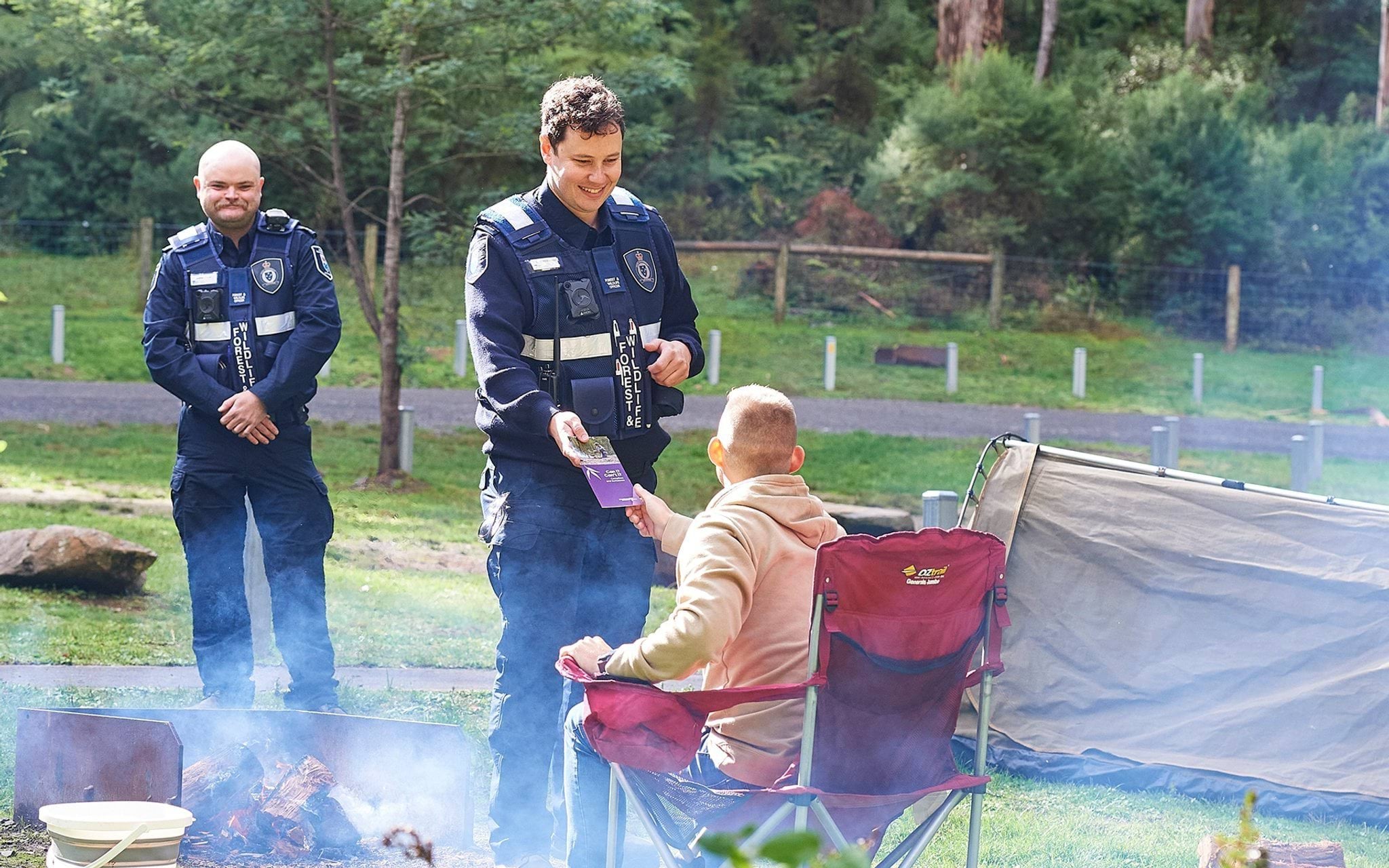 Authorised officers educating park visitors