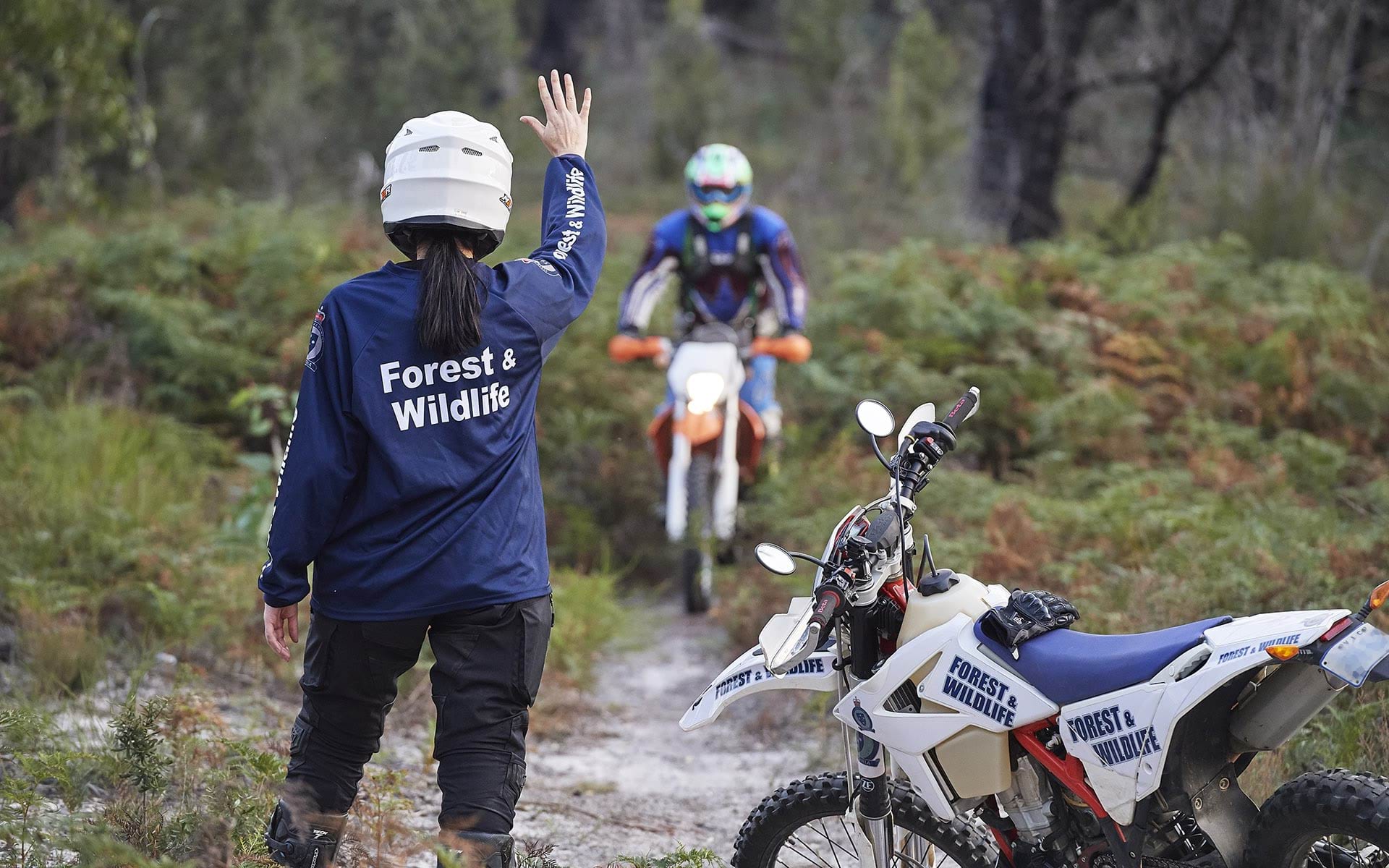 Authorised officer stopping trailbike rider