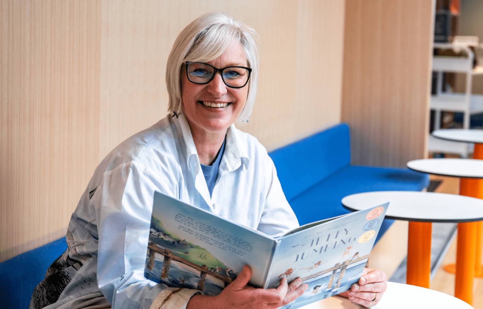 Author Andrea Rowe with a children’s book