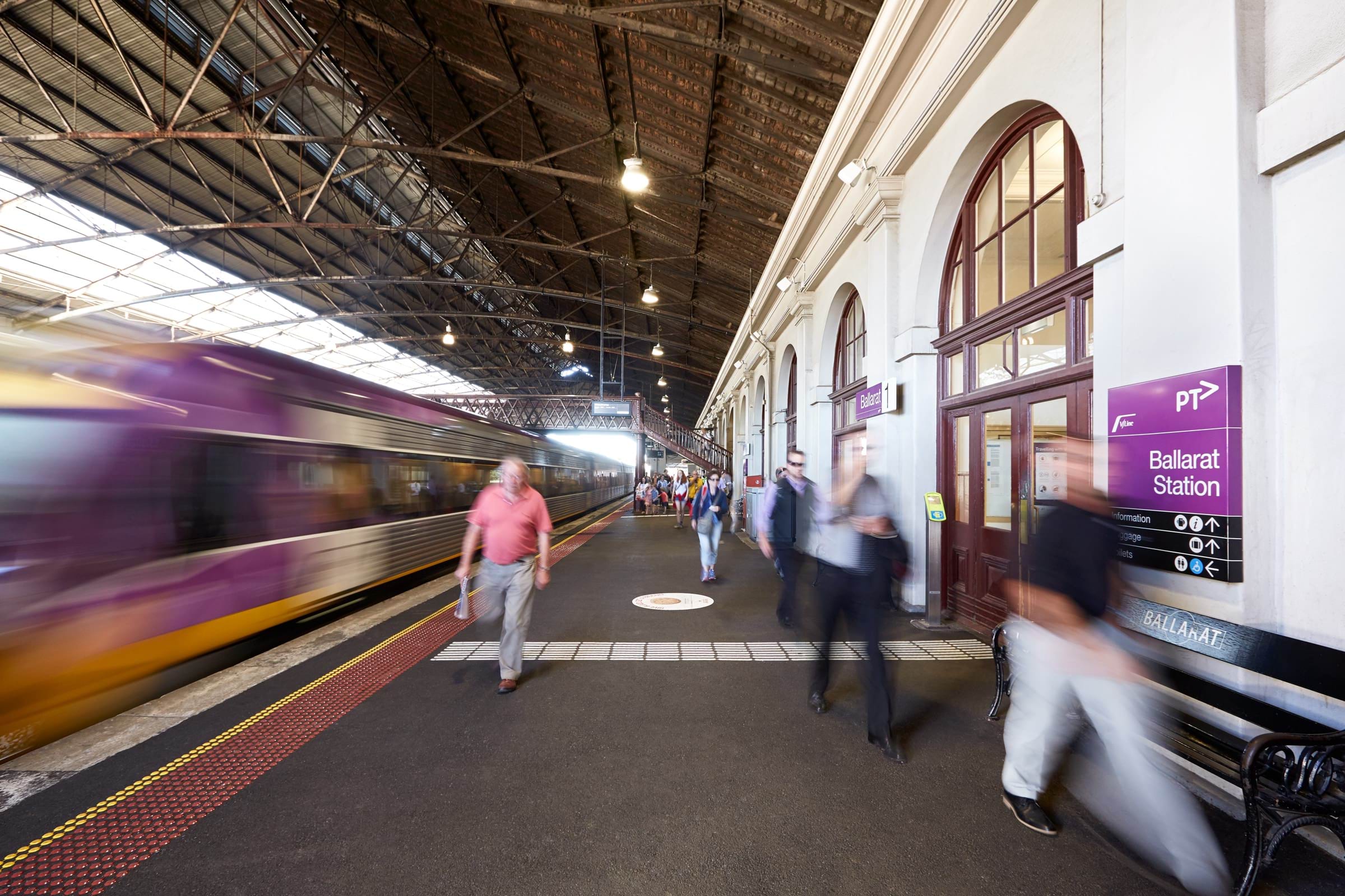 People walking through Ballarat Station.