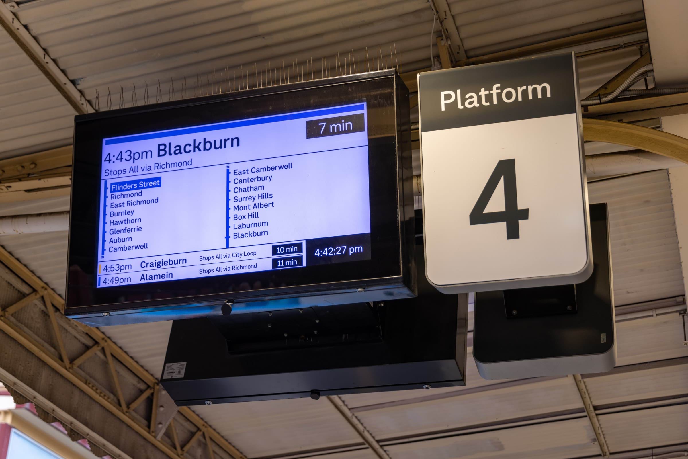 Image of a passenger information display with a train departing for Blackburn.