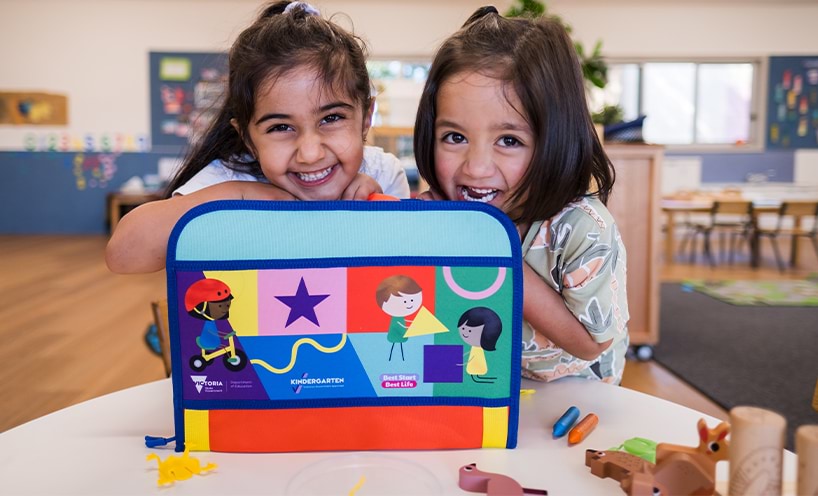 Two children with a Kinder Kit