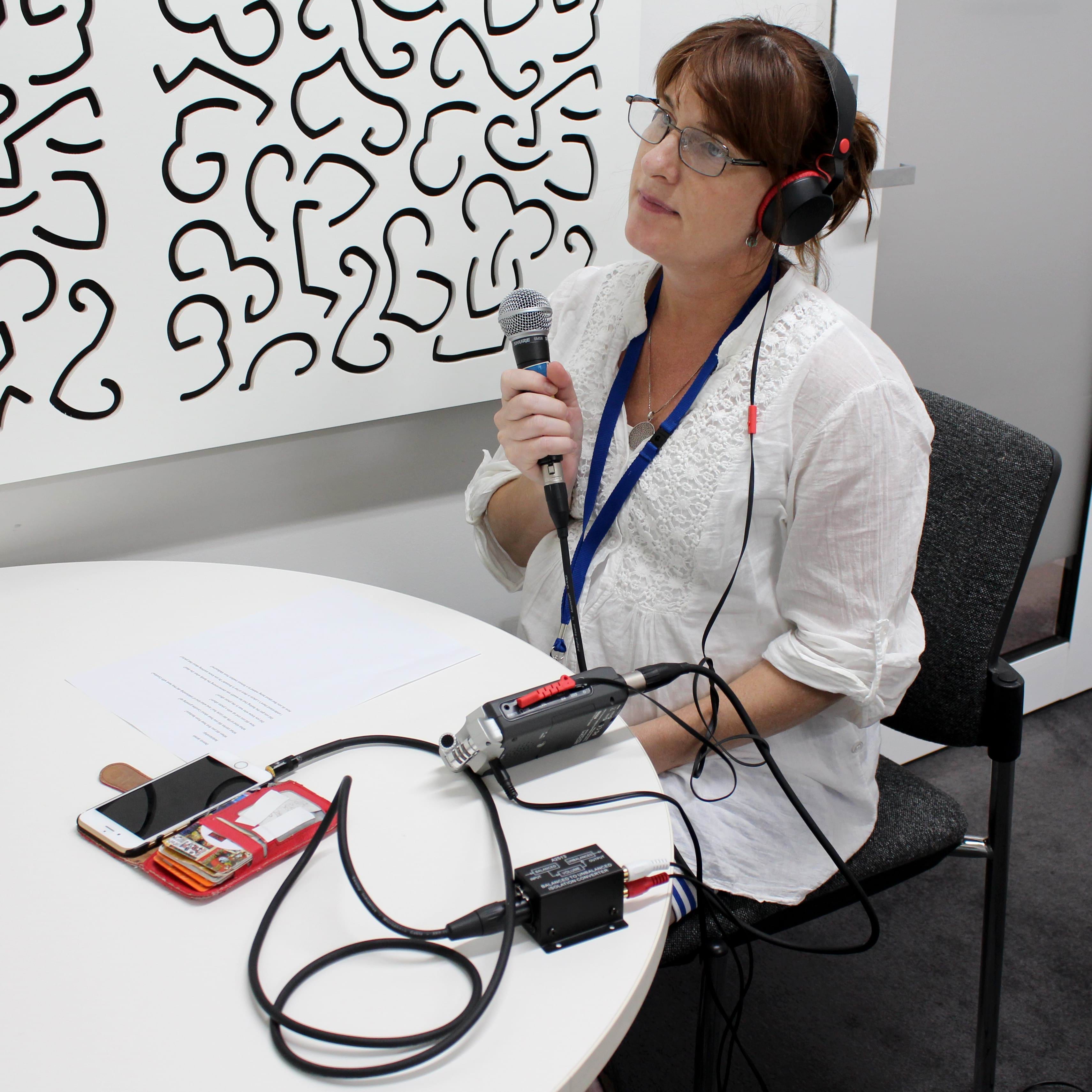 PROV host, Kate Follington, recording an episode of Public Record Office Victoria (PROV)’s award-winning podcast ‘Look history in the eye’. 