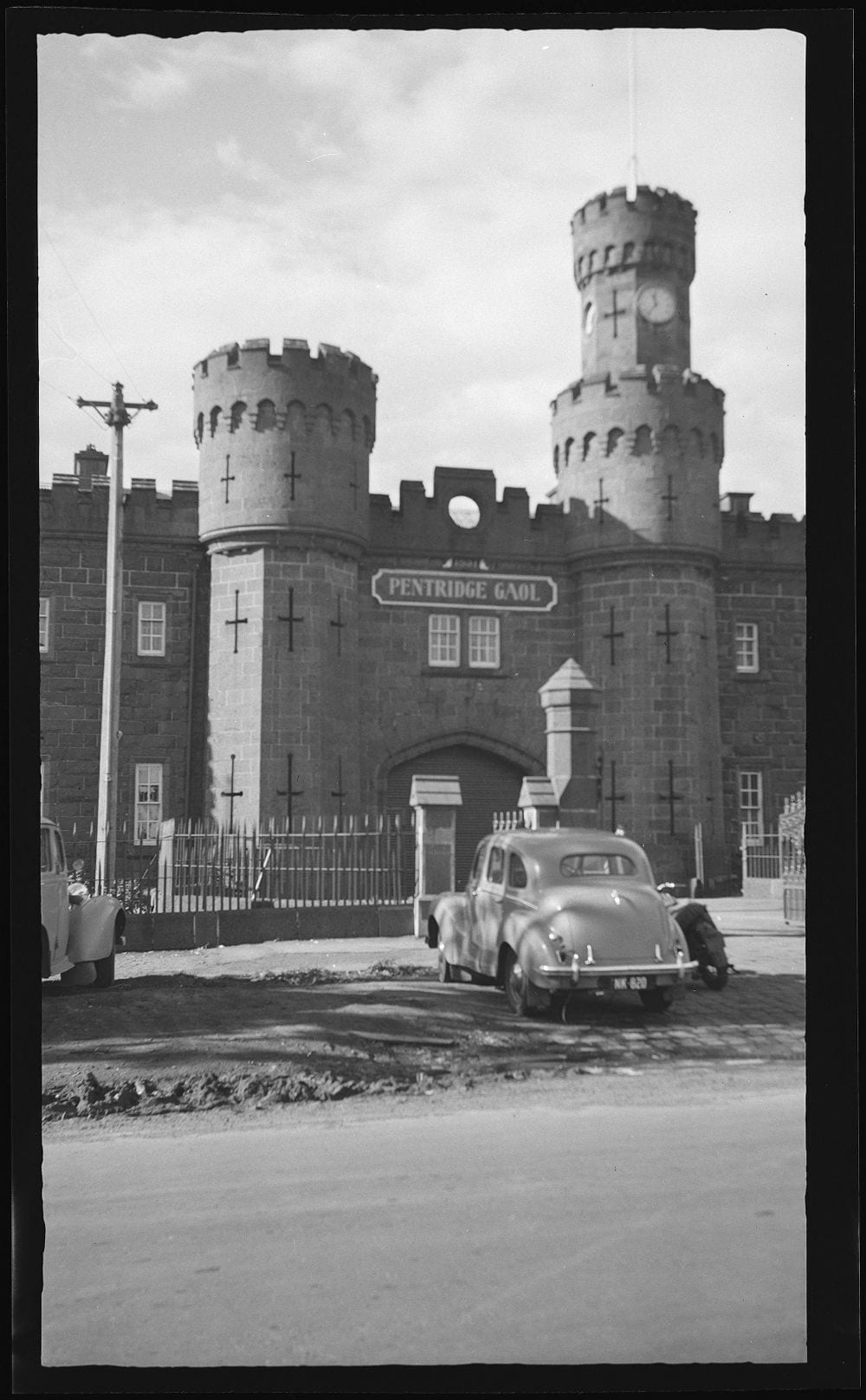 Pentridge Prison main gates (VPRS 10516/P0001), the Public Record Office Victoria (PROV)’s award-winning podcast ‘Look history in the eye’.  which details the history of the Gaol’s many escapes. 