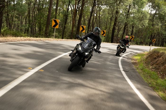 Image of two motorcyclists on a country road