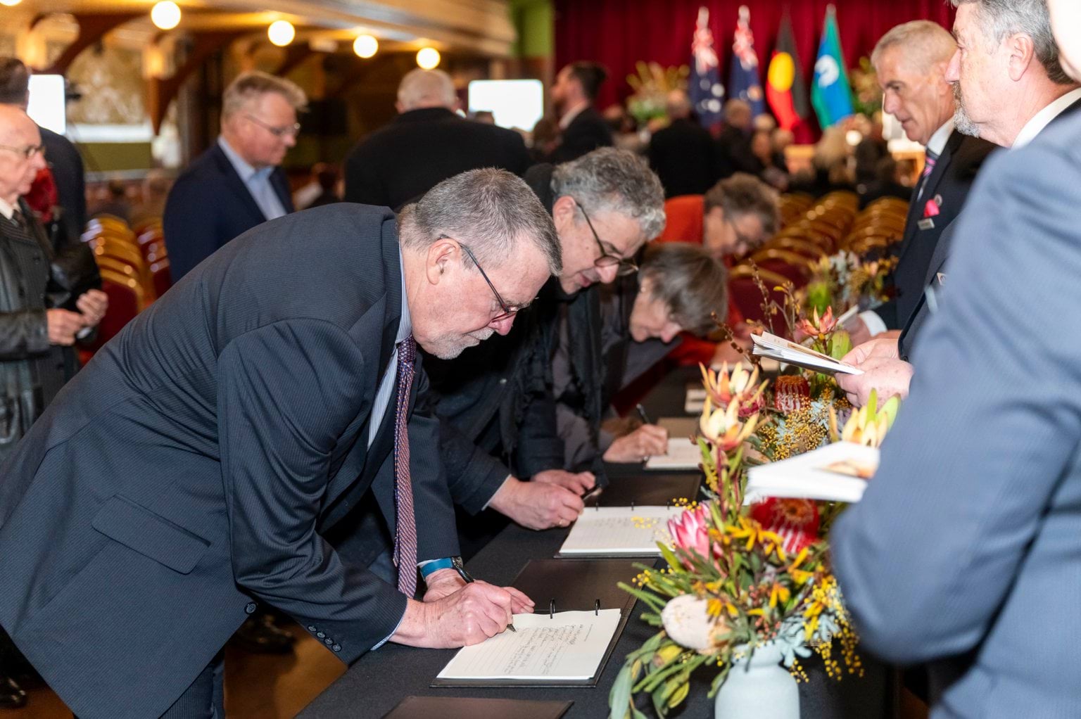 State Funeral Service for The Honourable Barry Pullen - Guests signing condolence books