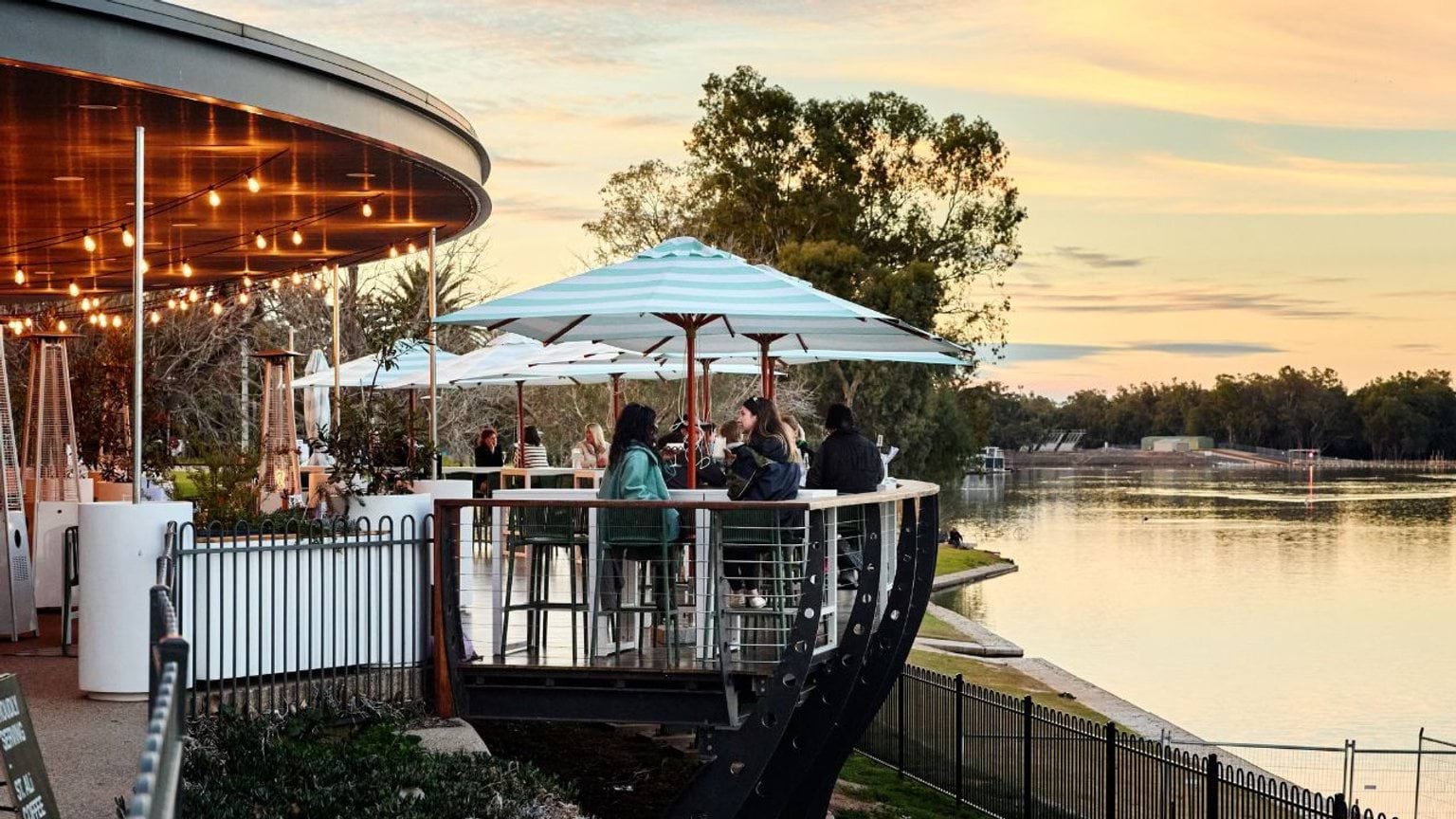 People sitting at the Mildura Boat House People sitting at the Mildura Boat House