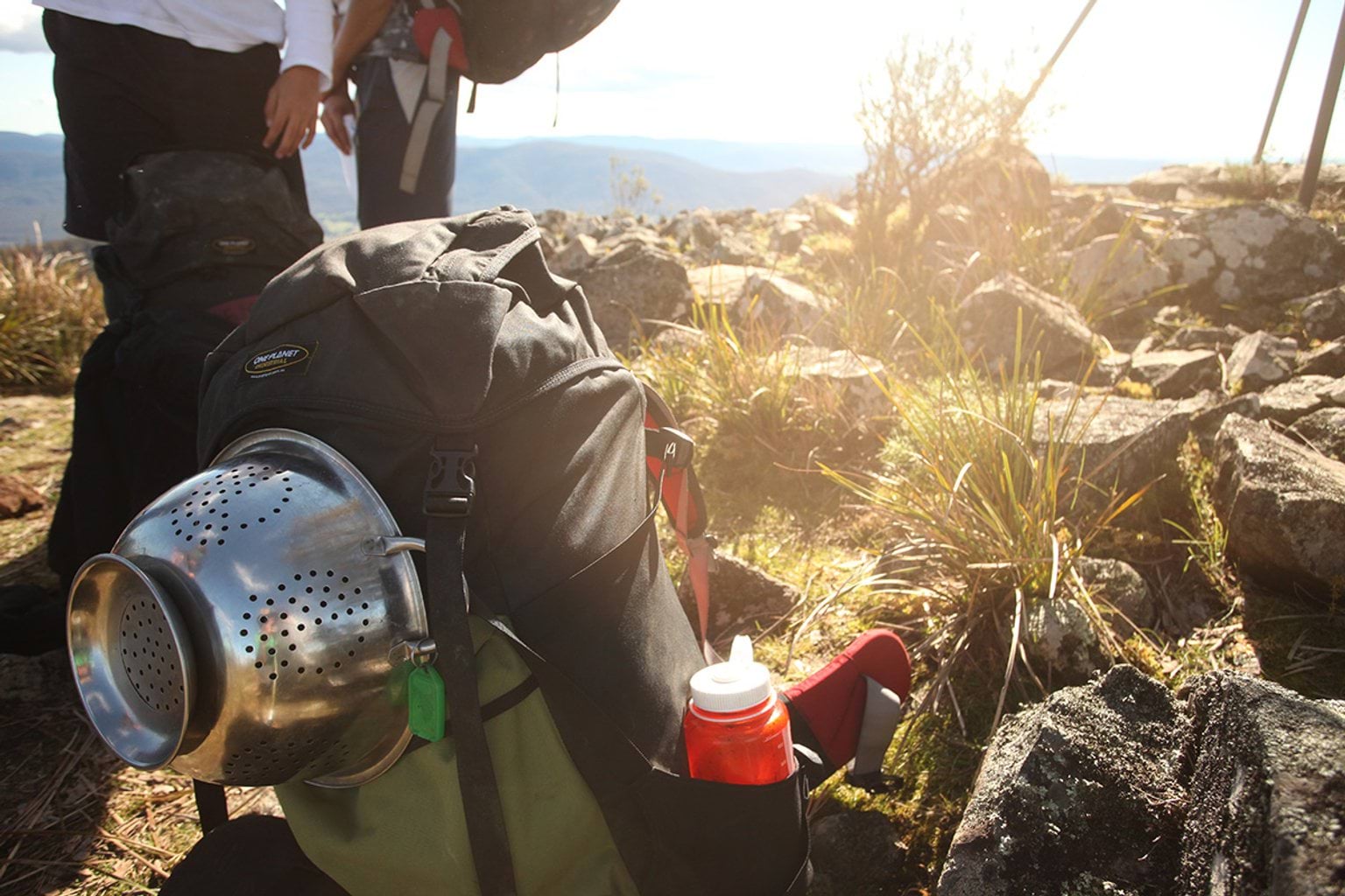 Outdoor hiking bag with colander attached
