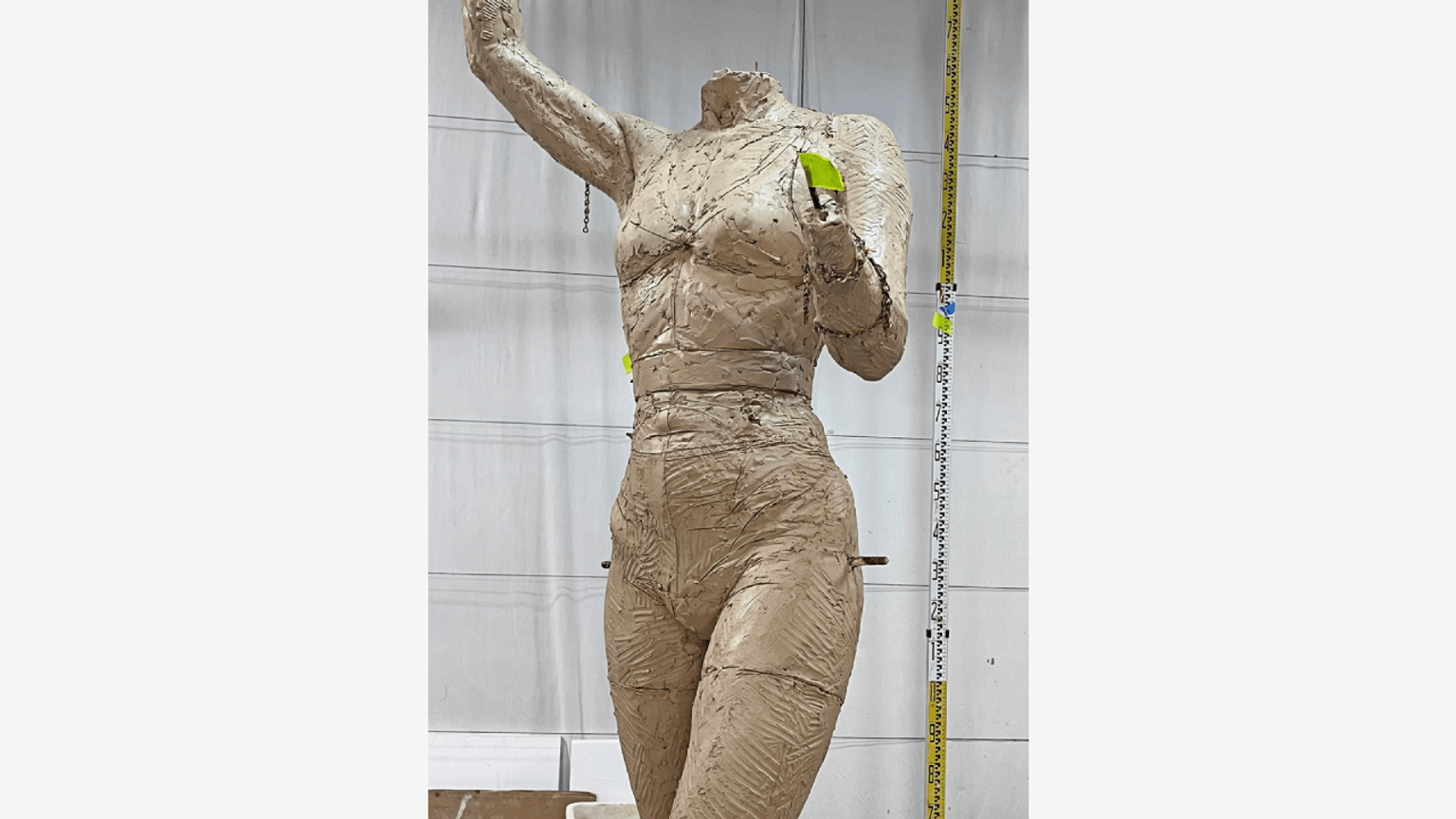 Barbara Rae statue armature and rough clay figure sculpting torso front