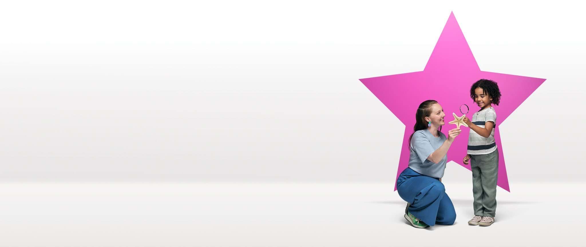 An early childhood educator shows a child a starfish in front of a pink star floating in a white space.