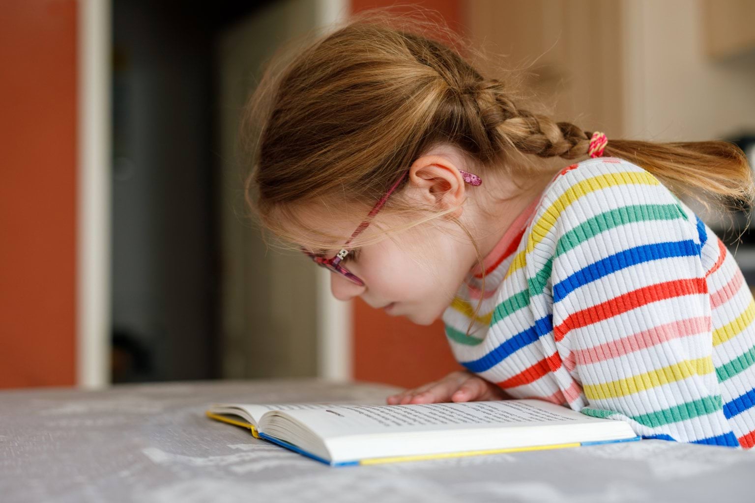 Child reading a book