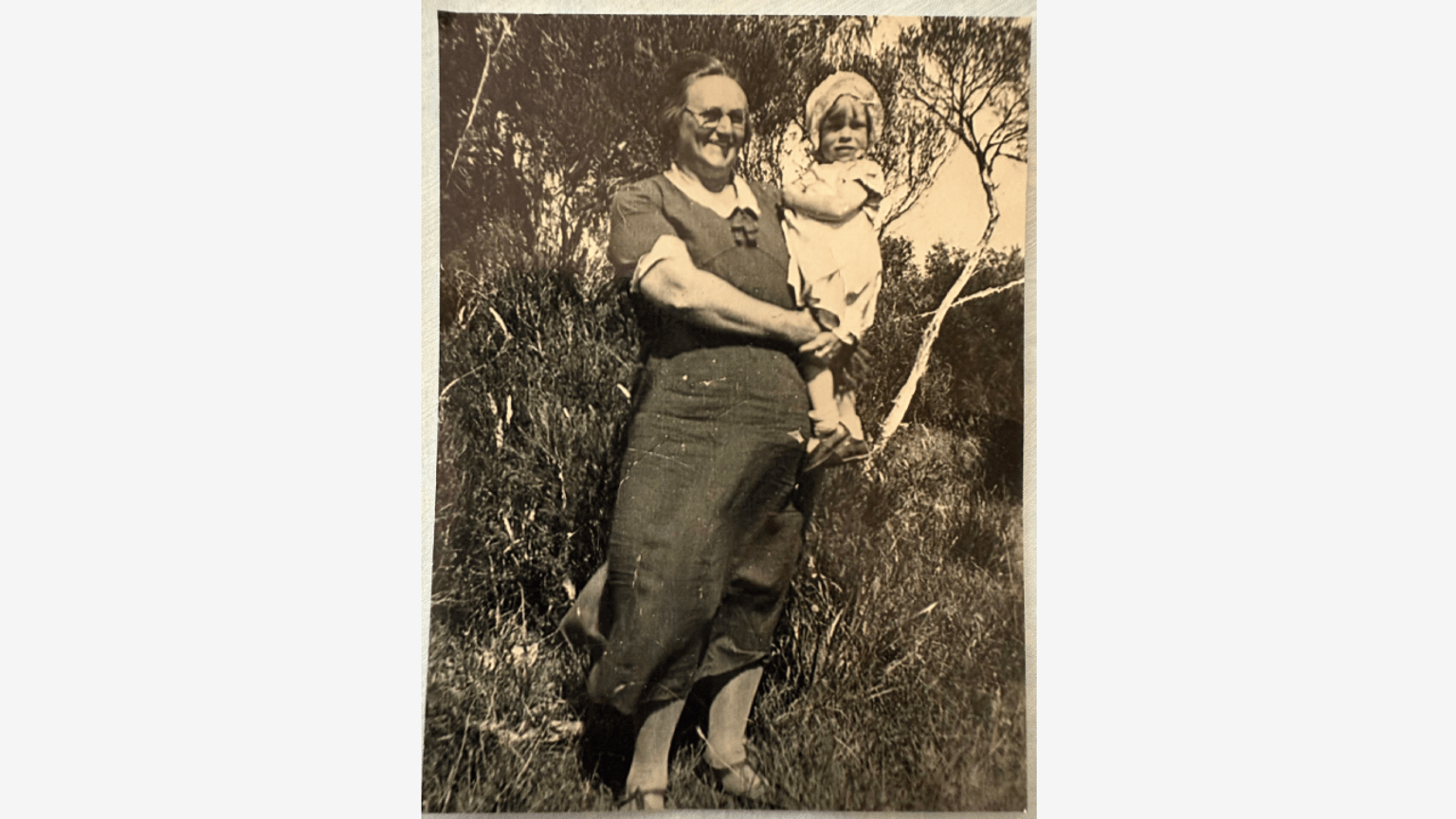 Agnes Chambers holding her first grandchild, Elaine Bickerton. Circa 1935.