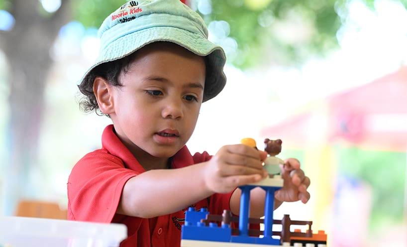 A child playing with building blocks