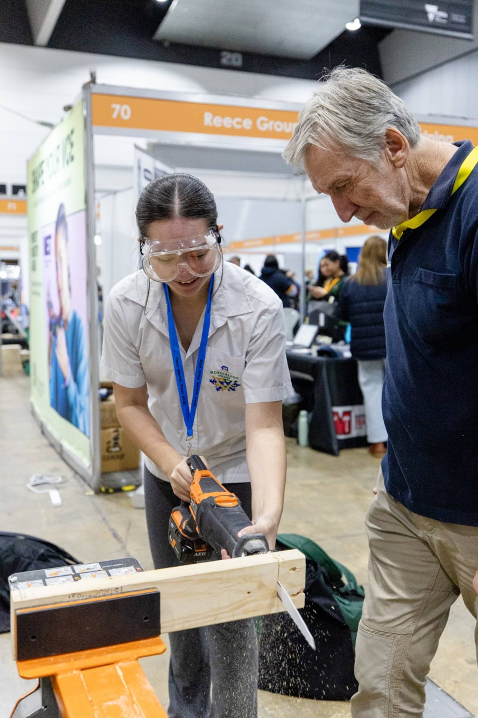 Female student trying out carpentry