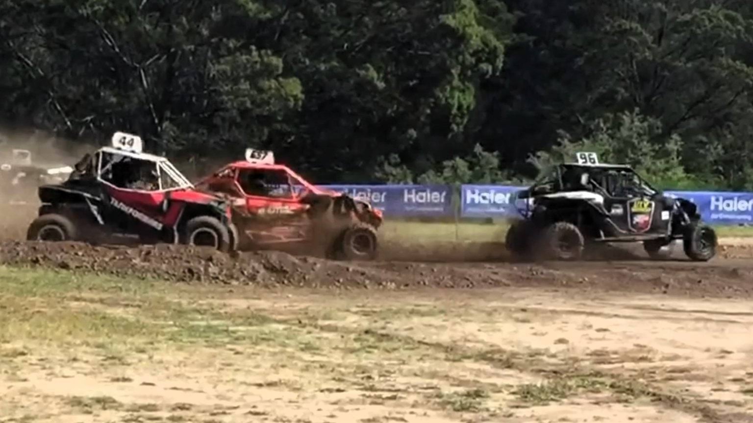 Mud bash vehicle racing around dirt track at Mafeking Rover Park