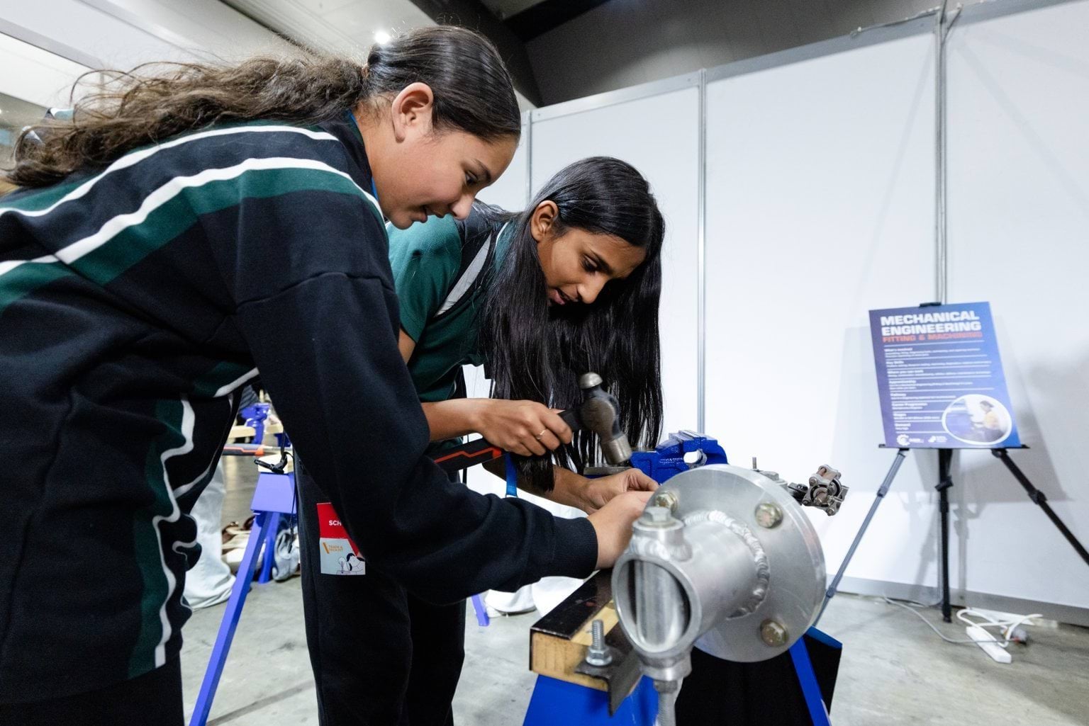 Female students using tools