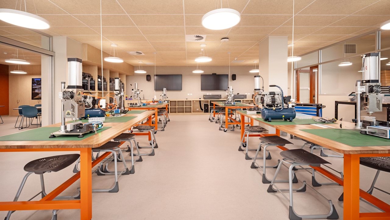 South West Tech School classroom featuring rows of desks with hands on tools.